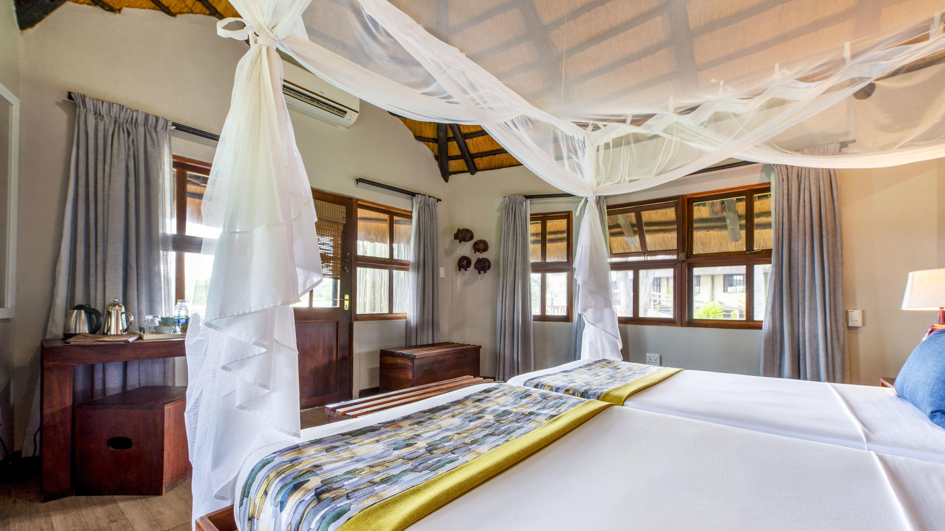 Hakusembe River Lodge Gondwana Collection Namibia — Triple Bungalow