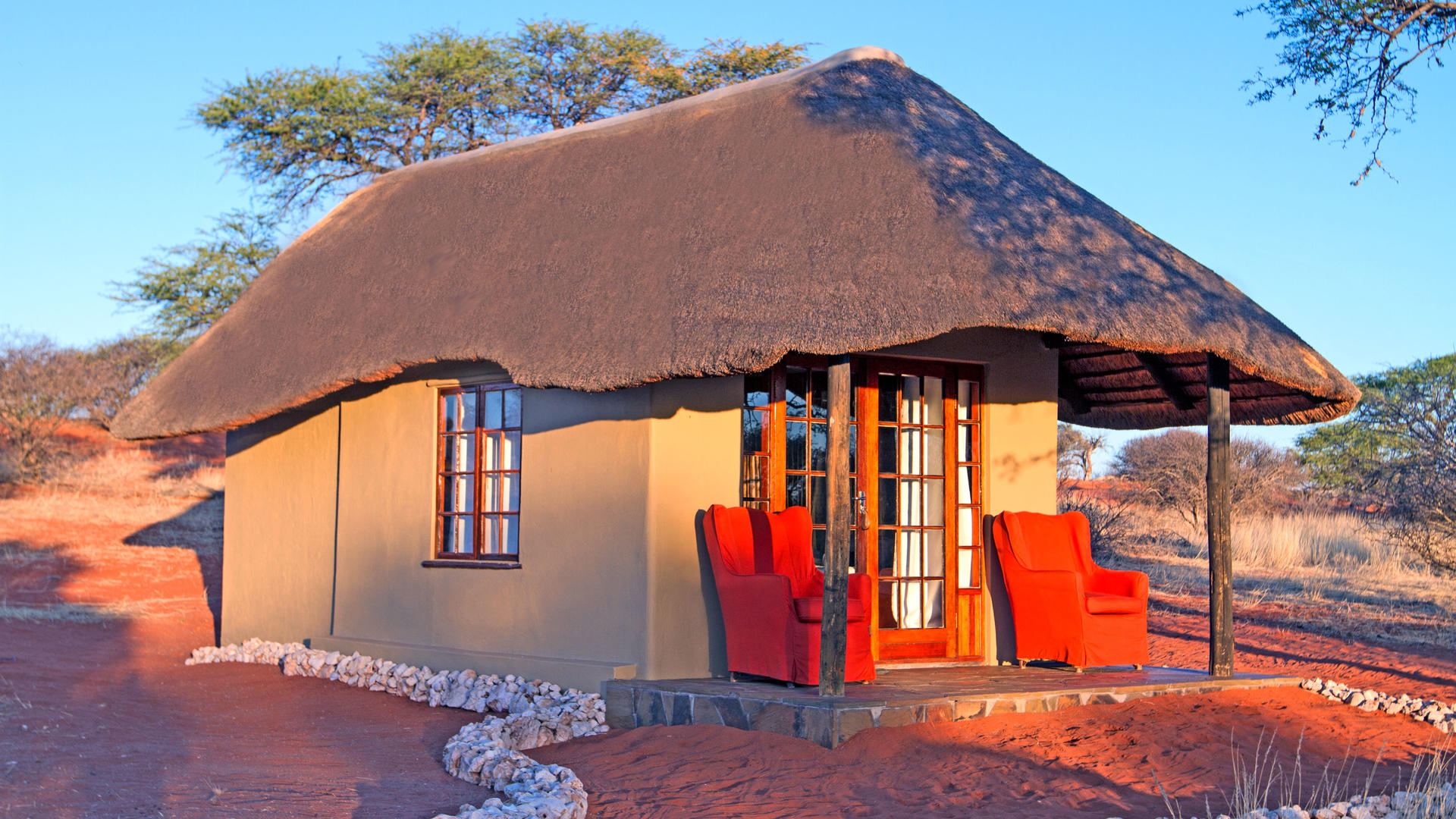 Camelthorn Kalahari Lodge — Thatched Chalet